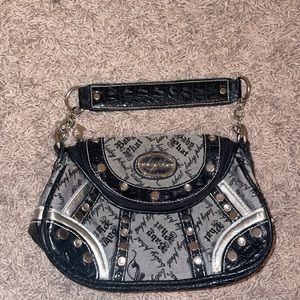 A mini shoulder baby phat purse
